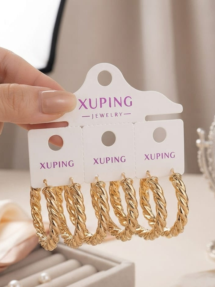 Arete argolla trensada rose xuping jewelry