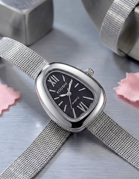 Reloj plateado modelo vintage correa enmallado