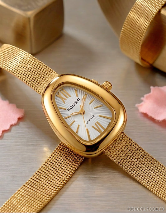 Reloj modelo vintage dorado correa enmallada