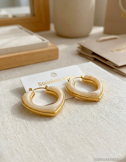 Arete corazón acrílico acero inoxidable con enchape en oro de 18k acero inoxidable
