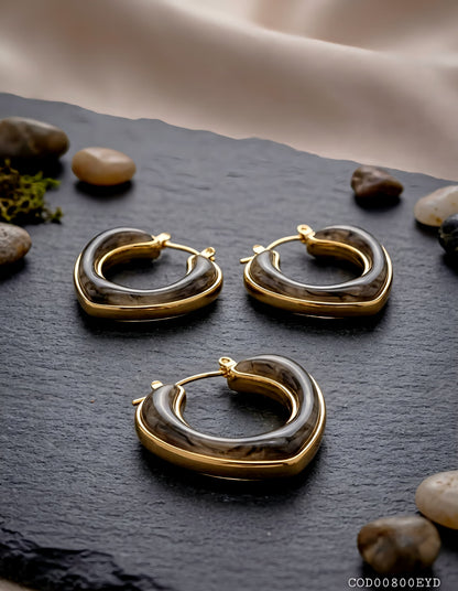 Arete corazón acrílico acero inoxidable con enchape en oro de 18k acero inoxidable