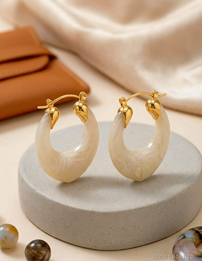 Arete modelo vintage acrílico acero inoxidable enchapado en oro de 18k