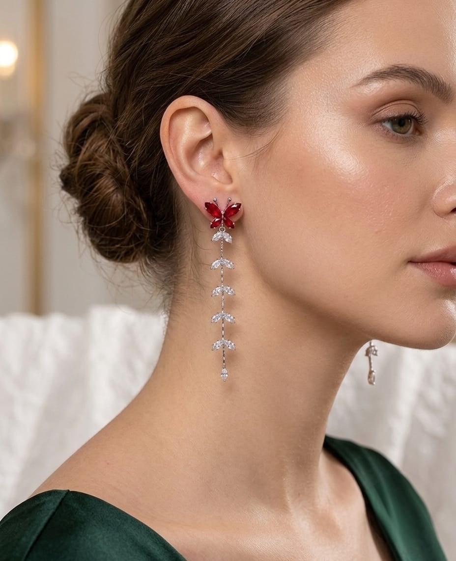 Aretes largo con zircon mariposa bañado en plata 925