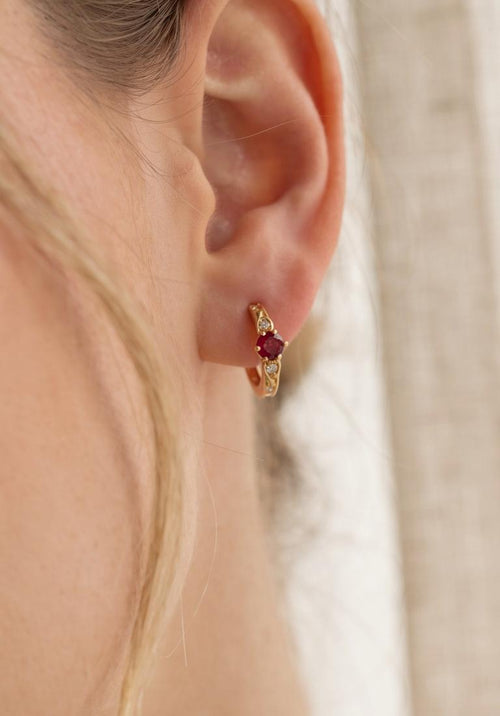 Arete zircon rojo