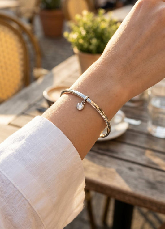 pulsera plateada +punto de luz